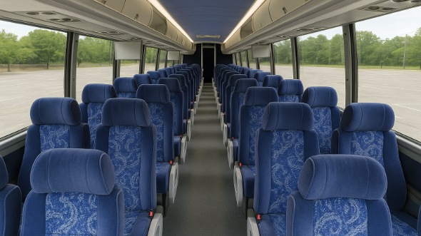 minot 54 passenger charter bus rental